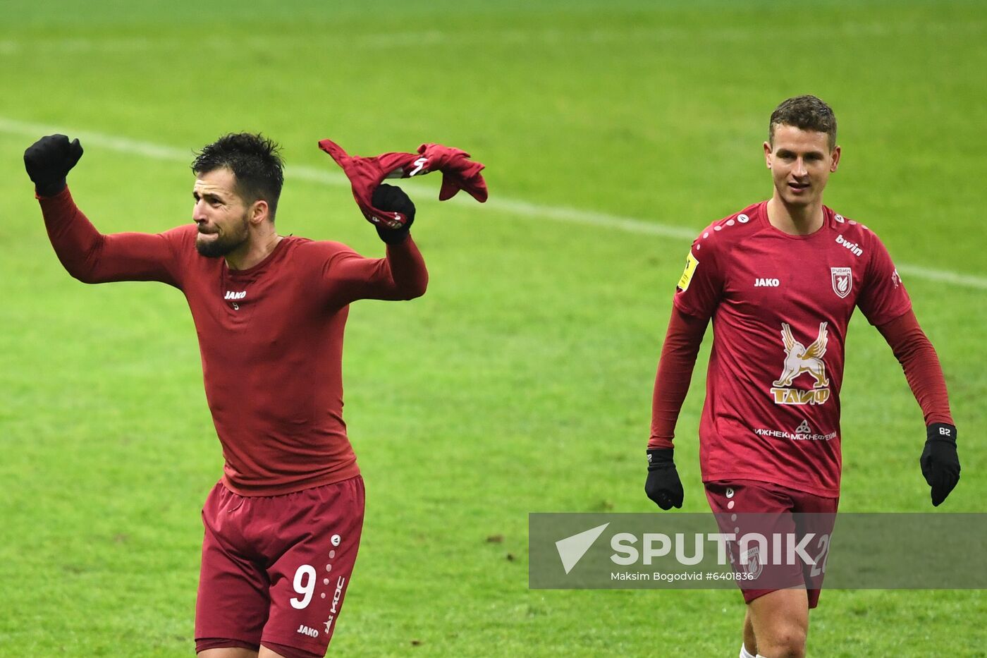 Rubin’s Djordje Despotovic, left, and Oliver Abildgaard celebrate a team's goal during the Russian Premier-League soccer match between Rubin Kazan and CSKA Moscow, in Kazan, Russia. Location: Russia, Republic of Tatarstan, Kazan. Author: Maksim Bogodvid/Sputnik. Russia Soccer Premier-League Rubin - CSKA