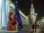 People walk past a statue of Father Frost, Russian equivalent of Santa Claus, installed ahead of the New Year on the Nevsky Prospect, in Saint Petersburg, Russia. Location: Russia, St. Petersburg. Author: Alexei Danichev/Sputnik. Russia New Year Preparations