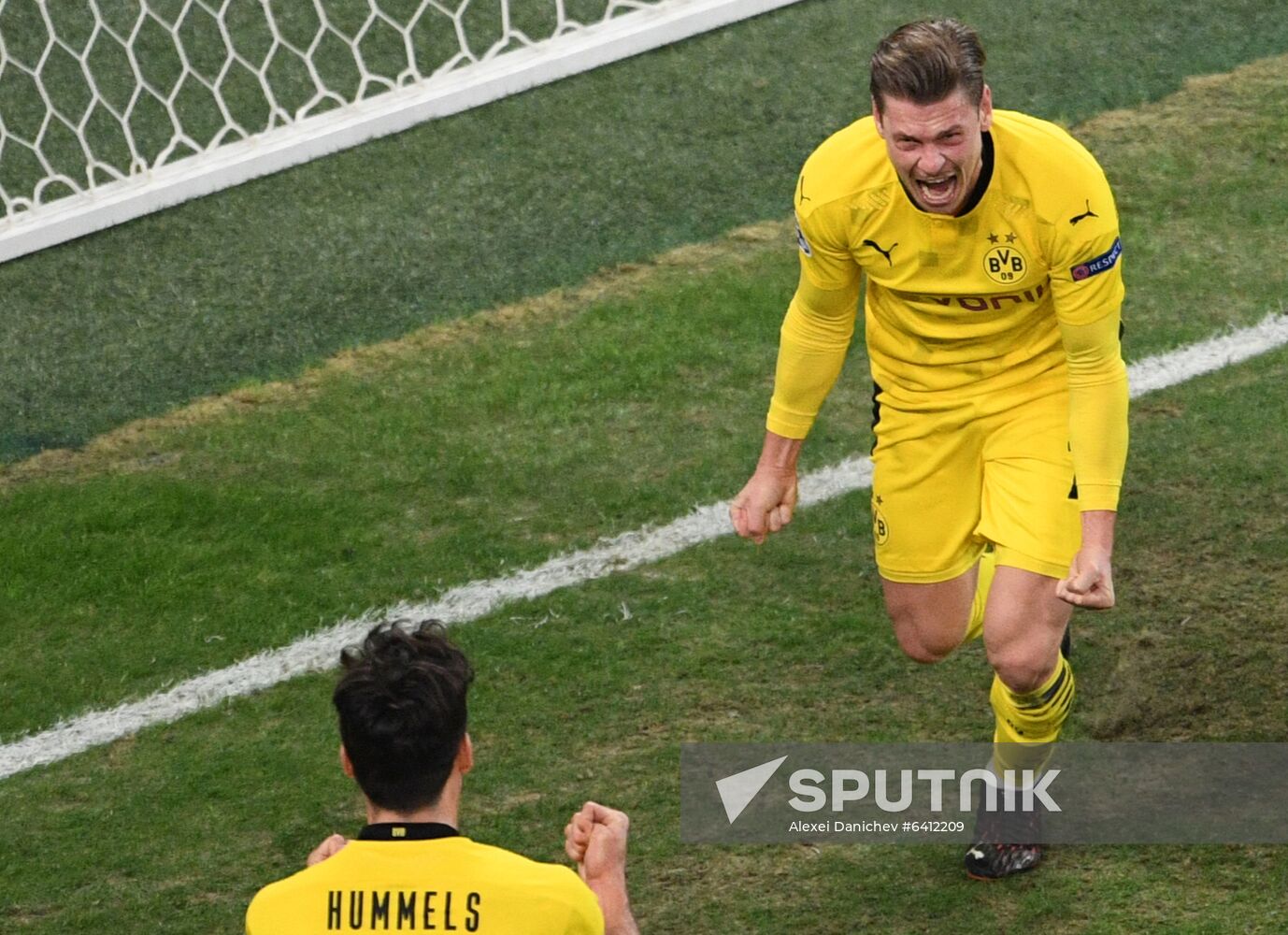 Borussia's Mats Hummels, left, and Lukasz Piszczek celebrate a goal during the Champions League soccer match between Zenit Saint Petersburg and Borussia Dortmund, in Saint Petersburg, Russia. Location: Russia, St. Petersburg. Author: Alexei Danichev/Sputnik. Russia Soccer Champions League Zenit - Borussia