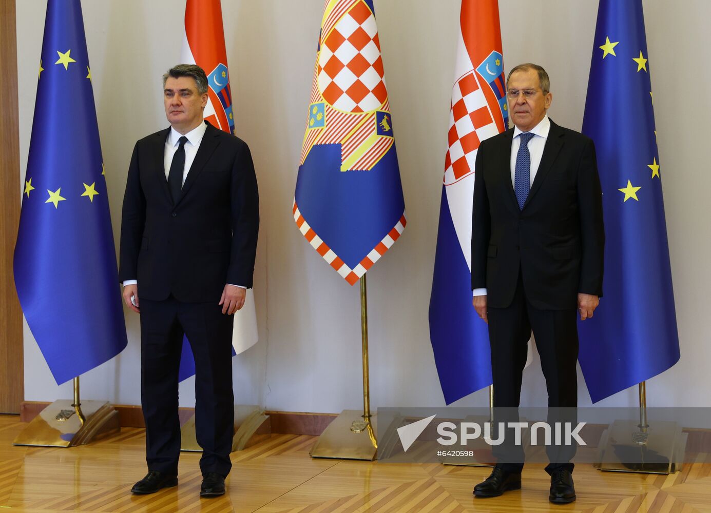 In this handout photo released by the Russian Foreign Ministry, Сroatian President Zoran Milanovic and Russian Foreign Minister Sergei Lavrov pose for a photo during a meeting in Zagreb, Croatia. Editorial use only, no archive, no commercial use. Location: Croatia, Zagreb. Croatia Russia