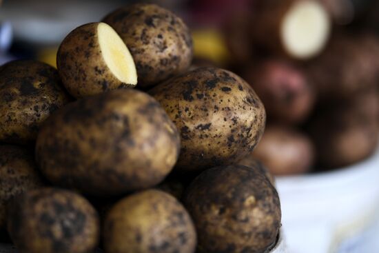 Selling potatoes at Preobrazhensky Market in Moscow