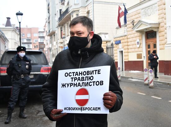 Russia Latvia Reporters Crackdown Protest