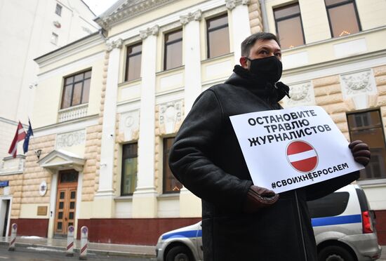 Russia Latvia Reporters Crackdown Protest