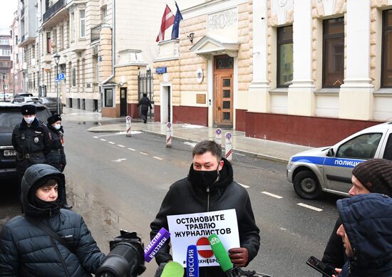 Russia Latvia Reporters Crackdown Protest