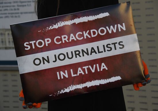 Russia Latvia Reporters Crackdown Protest