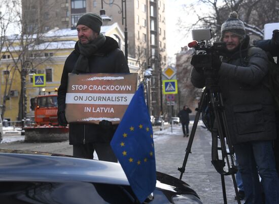 Russia Latvia Reporters Crackdown Protest