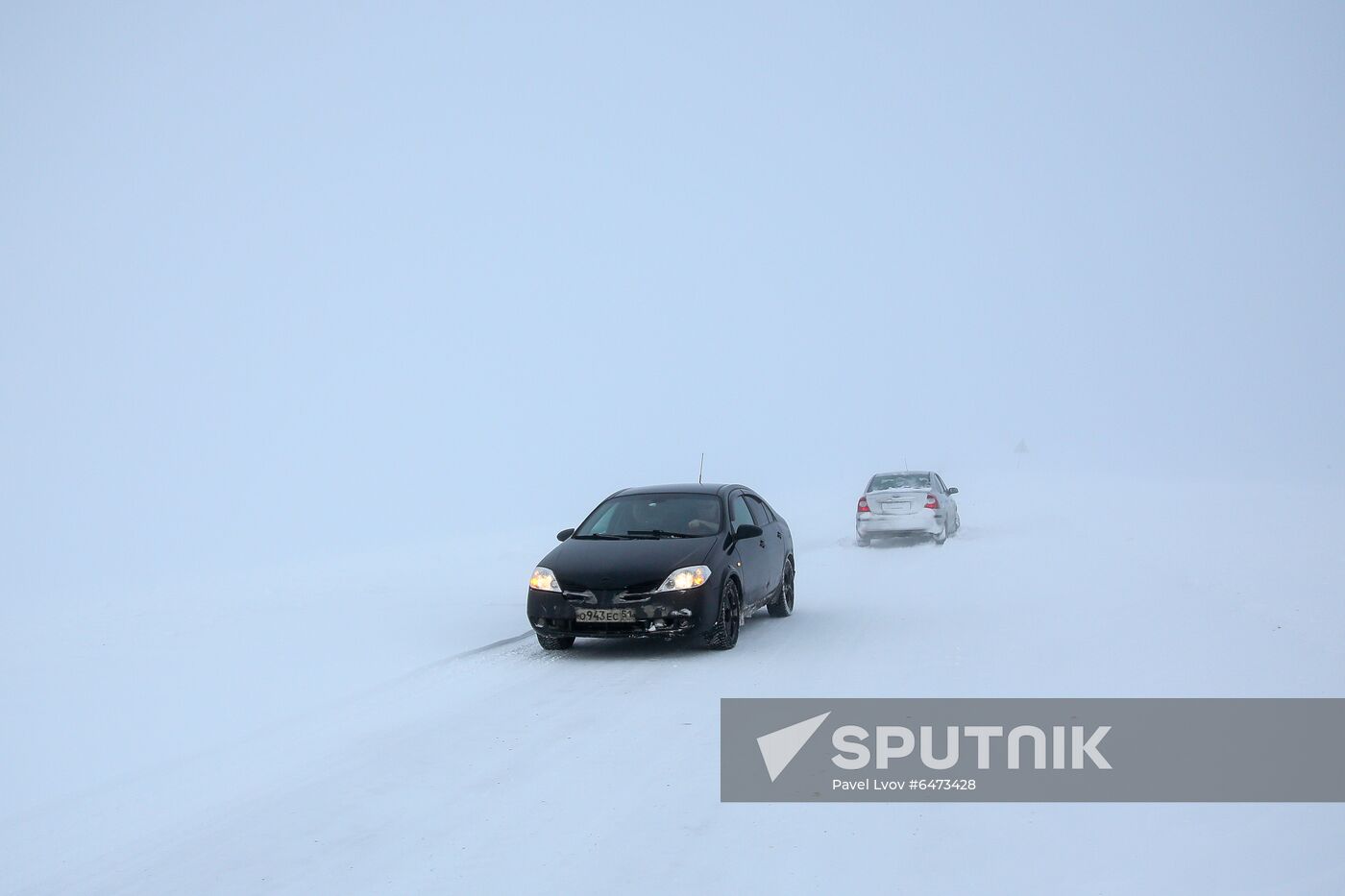 Russia Teriberka Snowstorm Cars Stuck