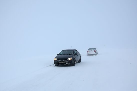 Russia Teriberka Snowstorm Cars Stuck