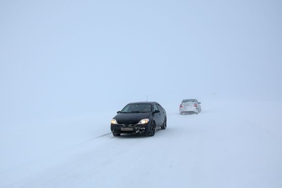 Russia Teriberka Snowstorm Cars Stuck