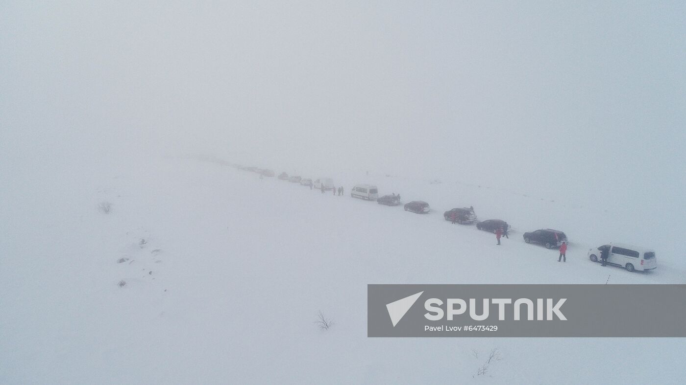 Russia Teriberka Snowstorm Cars Stuck