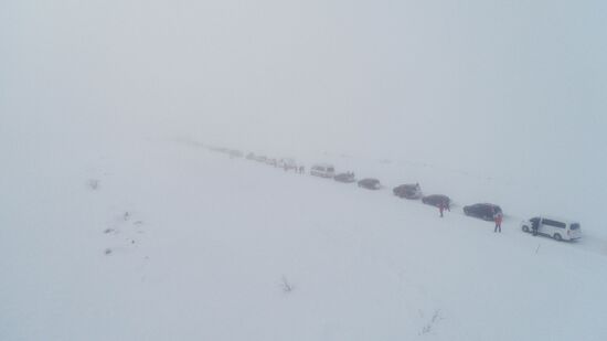 Russia Teriberka Snowstorm Cars Stuck