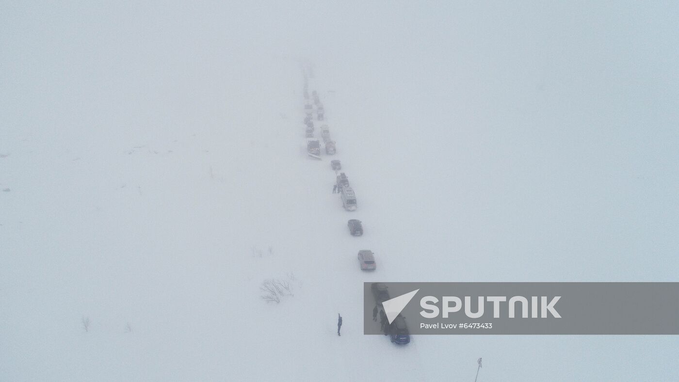 Russia Teriberka Snowstorm Cars Stuck