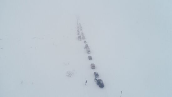 Russia Teriberka Snowstorm Cars Stuck