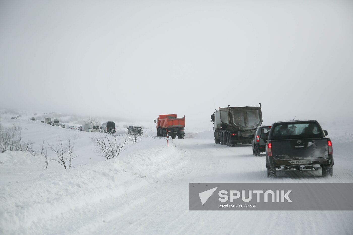 Russia Teriberka Snowstorm Cars Stuck