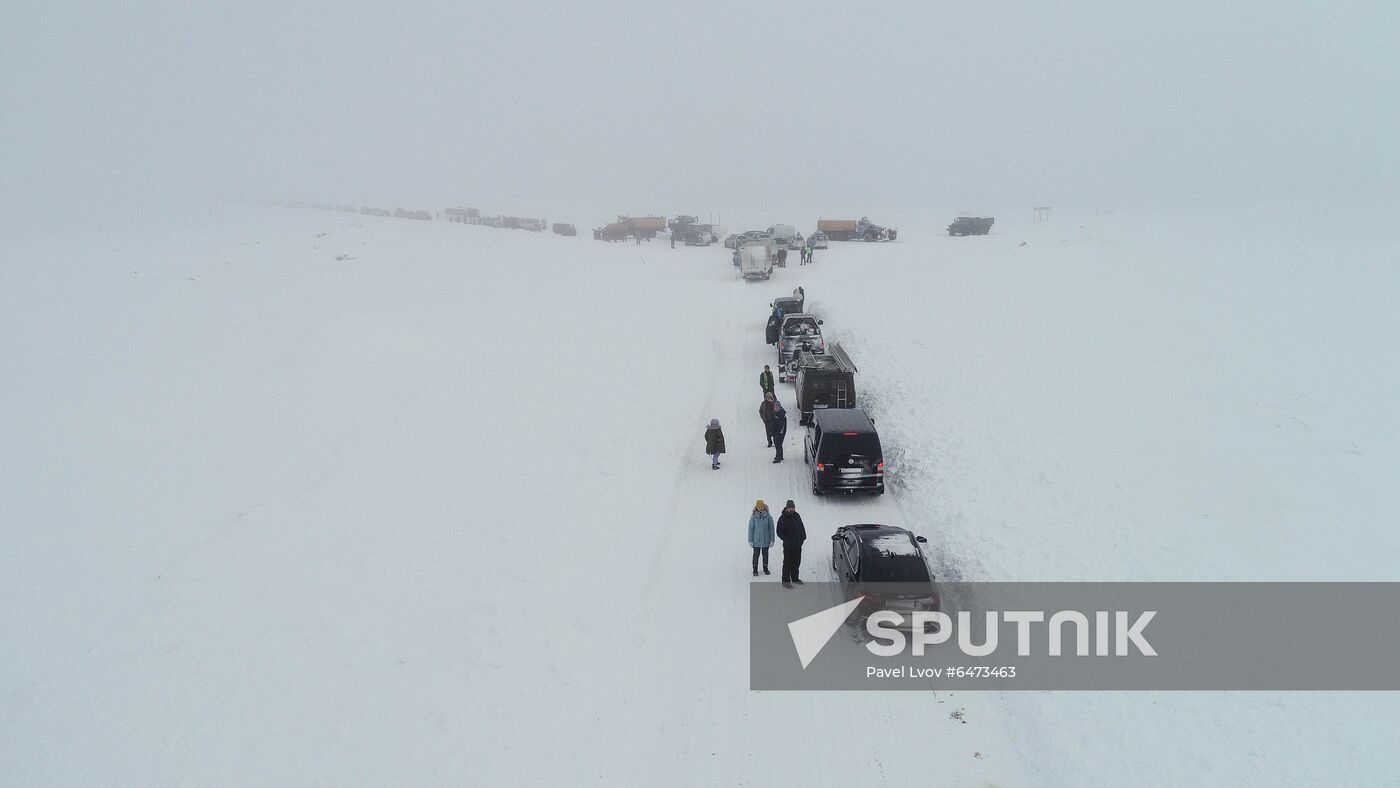 Russia Teriberka Snowstorm Cars Stuck