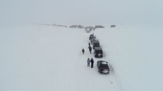 Russia Teriberka Snowstorm Cars Stuck