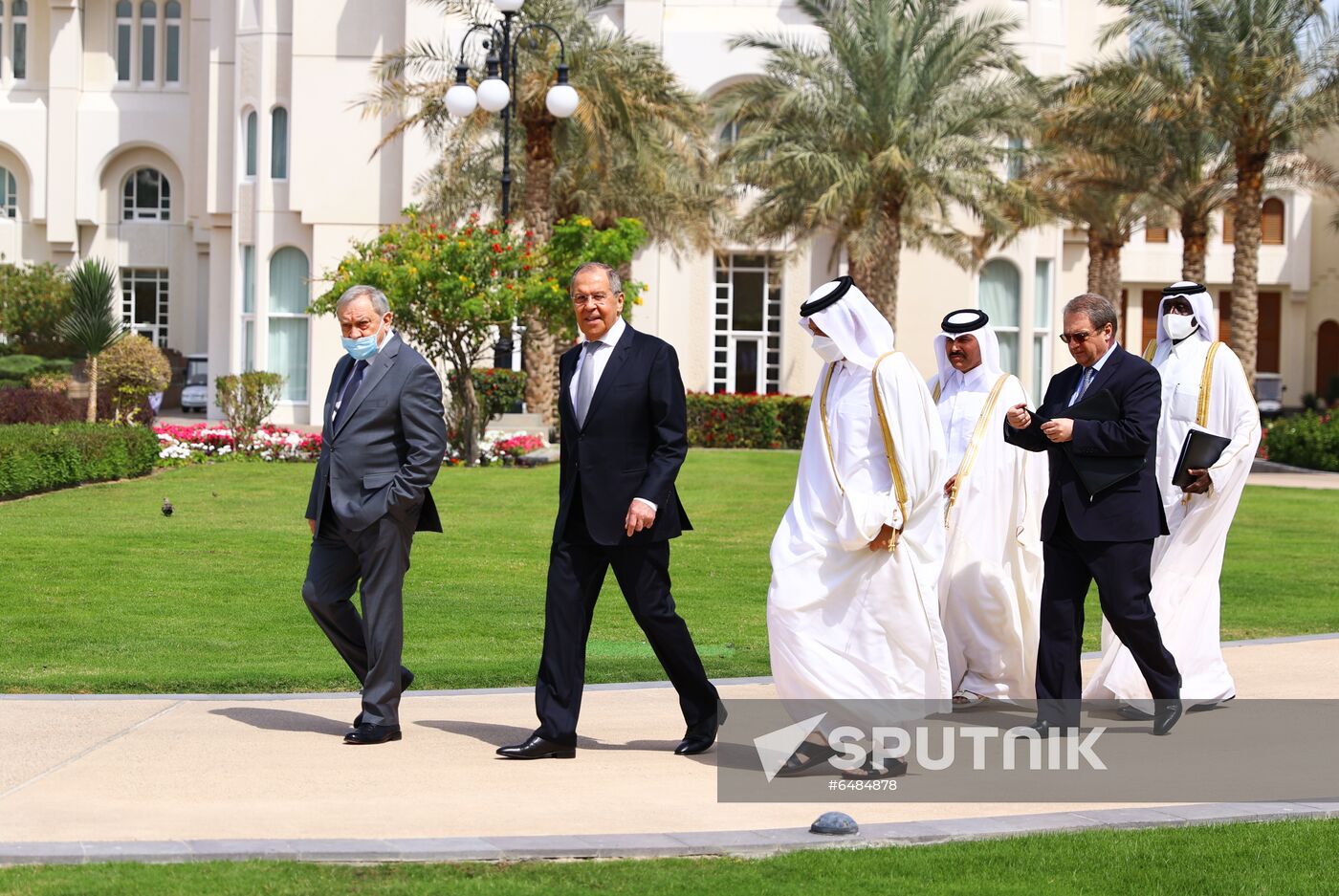 In this handout photo released by the Russian Foreign Ministry, Russian Foreign Minister Sergei Lavrov followed by his deputy Mikhail Bogdanov, right middle, and Ambassador to Qatar Nurmakhmad Kholov to his meeting with the Emir of Qatar, Sheikh Tamim bin Hamad al-Thani in Doha, Qatar. Editorial use only, no archive, no commercial use. Location: Qatar, Doha. Qatar Russia Turkey