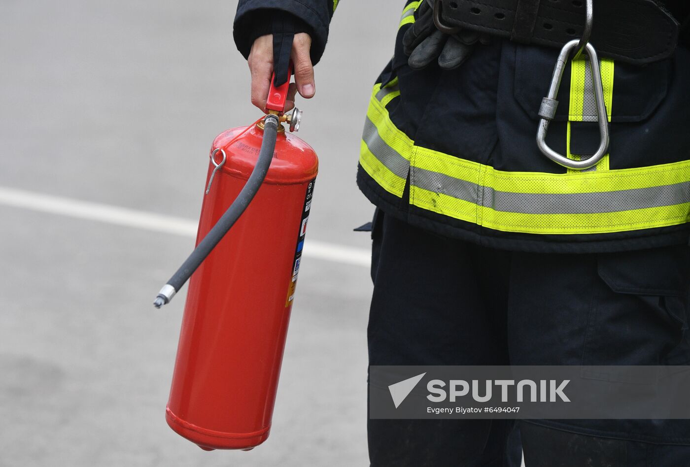 Using fire extinguisher