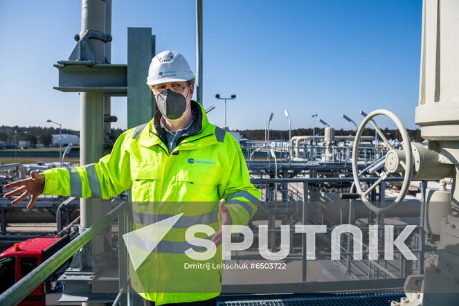 A Nord Stream 2 employee stands on a platform in the Nord Stream 2 Baltic Sea pipeline's receiving station, where six and a half million cubic meters of natural gas per hour will be processed and delivered to downstream pipelines at the right pressure, in Lubmin, Germany. Location: Germany, Lubmin. Author: Dmitrij Leltschuk/Sputnik. Germany Nord Stream Gas Pipeline