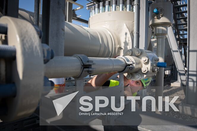 A Nord Stream 2 employee works on a platform in the Nord Stream 2 Baltic Sea pipeline's receiving station, where six and a half million cubic meters of natural gas per hour will be processed and delivered to downstream pipelines at the right pressure, in Lubmin, Germany. Location: Germany, Lubmin. Author: Dmitrij Leltschuk/Sputnik. Germany Nord Stream Gas Pipeline