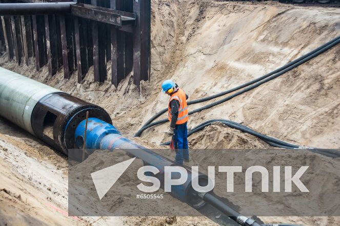 In this handout photo released by the press-service of Eugal, an employee works at the construction site of the Eugal pipeline, in Germany. The Eugal pipeline, which will receive gas from Nord Stream 2 in the future, has reached full pumping capacity, and the second line of the pipeline has been introduced. European gas pipeline link (EUGAL) is a 480km-long natural gas transport network being developed in order to strengthen the supply of natural gas to Germany and Europe. Editorial use only, no archive, no commercial use. Location: Germany. Germany Nord Stream Gas Pipeline