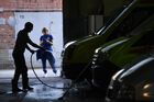 A paramedic waits for an ambulance car to be washed at an ambulance station in Novosibirsk, Russia. Location: Russia, Novosibirsk. Author: Alexandr Kryazhev/Sputnik. Russia Ambulance