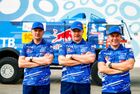 In this handout photo released by kamazmaster.ru, from left, KAMAZ-Master's mechanic Igor Leonov, co-driver Andrey Mokeev and driver Andrey Karginov pose for a photo before the first stage of the Dakar rally from Jeddah to Al Wajh, in Saudi Arabia. Editorial use only, no archive, no commercial use. Location: Saudi Arabia. Saudi Arabia Dakar Kamaz