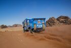 In this handout photo released by kamazmaster.ru, KAMAZ-Master's driver Anton Shibalov, co-driver Dmitry Nikitin and mechanic Ivan Tatarinov compete during the third stage of the Dakar rally from Neom to Neom, in Saudi Arabia. Editorial use only, no archive, no commercial use. Saudi Arabia Dakar Kamaz