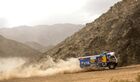 In this handout photo released by kamazmaster.ru, KAMAZ-Master's driver Anton Shibalov, co-driver Dmitri Nikitin and mechaniс Ivan Tatarinov steer their truck during the fourth stage of the Dakar rally from Neom to Al Ula, in Saudi Arabia. Editorial use only, no archive, no commercial use. Location: Saudi Arabia. Saudi Arabia Dakar Kamaz