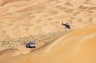 In this handout photo released by kamazmaster.ru, KAMAZ-Master's driver Eduard Nikolaev, mechaniс Vladimir Rybakov and co-driver Evgenii Iakovlev steer their truck during the eleventh stage of the Dakar rally from Shubaytah to Haradh, in Saudi Arabia. Editorial use only, no archive, no commercial use. Location: Saudi Arabia. Saudi Arabia Dakar Kamaz