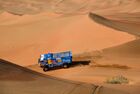 In this handout photo released by kamazmaster.ru, KAMAZ-Master's driver Eduard Nikolaev, mechaniс Vladimir Rybakov and co-driver Evgenii Iakovlev steer their truck during the eleventh stage of the Dakar rally from Shubaytah to Haradh, in Saudi Arabia. Editorial use only, no archive, no commercial use. Location: Saudi Arabia. Saudi Arabia Dakar Kamaz