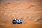 In this handout photo released by kamazmaster.ru, KAMAZ-Master's driver Dmitry Sotnikov, mechaniс Ilgiz Akhmetzianov and co-driver Ruslan Akhmadeev steer their truck during the eleventh stage of the Dakar rally from Shubaytah to Haradh, in Saudi Arabia. Editorial use only, no archive, no commercial use. Location: Saudi Arabia. Saudi Arabia Dakar Kamaz