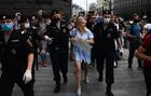 Police officers detain a woman holding a picket to protest the arrest of adviser to the head of the Russian space agency Roscosmos Ivan Safronov suspected of working for one of NATO intelligence services outside Russian Federal Security Service headquarters, in Moscow, Russia. Location: Russia, Moscow. Author: Evgeny Odinokov. Russia High Treason Suspect Detained