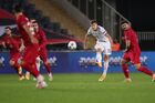 In this handout photo released by Russian Football Union, Russia's Roman Zobnin, centre, kicks the ball during the Nations League soccer match between Turkey and Russia, in Istanbul, Turkey. Editorial use only, no archive, no commercial use. Location: Turkey, Istanbul. Author: Mikhail Shapayev/Sputnik. Turkey Soccer Nations League Turkey - Russia