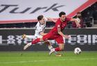 In this handout photo released by Russian Football Union, Russia's Daler Kuzyaev, left, and Turkey's Okay Yokuslu struggle for the ball during the Nations League soccer match between Turkey and Russia, in Istanbul, Turkey. Editorial use only, no archive, no commercial use. Location: Turkey, Istanbul. Author: Mikhail Shapayev/Sputnik. Turkey Soccer Nations League Turkey - Russia