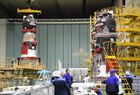 In this handout photo released by Russian Space Agency Roscosmos, the Soyuz MS-18 transport manned spacecraft is pictured as it is delivered to the assembly and test building site No. 254 after refueling with fuel components and compressed gas, at the Baikonur Cosmodrome, Kazakhstan. The emblem for the 60th anniversary of the first ever human flight into space includes the profile and autograph of Yuri Gagarin and is placed on the Soyuz-2.1 launch vehicle. The launch of the Soyuz a carrier rocket with the Soyuz MS-18 manned spacecraft, named after Gagarin, is scheduled for April 9. Editorial use only, no archive, no commercial use. Location: Kazakhstan, Baikonur. Kazakhstan Russia Space