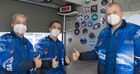 In this handout photo released by Russian Space Agency Roscosmos, from left, NASA astronaut Mark Vande Hai, Roscosmos cosmonauts Oleg Novitsky and Pyotr Dubrov, members of the ISS-65 prime crew, give the thumbs up after checking the final configuration of the Soyuz MS-18 spacecraft named after Soviet cosmonaut Yuri Gagarin at the Baikonur cosmodrome, Kazakhstan. Editorial use only, no archive, no commercial use. Location: Baikonur. Kazakhstan Russia Space