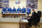 In this handout photo released by Russian Space Agency Roscosmos, from left, International Space Station (ISS) Expedition 65 prime and backup crew members NASA astronaut Mark Vande Hai, Roscosmos cosmonauts Oleg Novitsky and Pyotr Dubrov, NASA astronaut Ann McClain and Roscosmos cosmonauts Anton Shkaplerov and Oleg Artemyev talk to the media during a news conference at the Baikonur cosmodrome, Kazakhstan. The launch of the Soyuz-2.1a carrier rocket with the Soyuz MS-18 manned spacecraft painted with the portrait of Russian cosmonaut Yuri Gagarin, is scheduled for April 9. Editorial use only, no archive, no commercial use. Location: Kazakhstan, Baikonur. Kazakhstan Russia Space