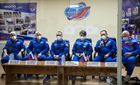 In this handout photo released by Russian Space Agency Roscosmos, from left, International Space Station (ISS) Expedition 65 prime and backup crew members NASA astronaut Mark Vande Hai, Roscosmos cosmonauts Oleg Novitsky and Pyotr Dubrov, NASA astronaut Ann McClain and Roscosmos cosmonauts Anton Shkaplerov and Oleg Artemyev talk to the media during a news conference at the Baikonur cosmodrome, Kazakhstan. The launch of the Soyuz-2.1a carrier rocket with the Soyuz MS-18 manned spacecraft painted with the portrait of Russian cosmonaut Yuri Gagarin, is scheduled for April 9. Editorial use only, no archive, no commercial use. Location: Kazakhstan, Baikonur. Kazakhstan Russia Space