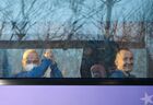 In this handout photo released by Russian Space Agency Roscosmos, International Space Station (ISS) Expedition 65 crew members NASA astronaut Mark Vande Hai, Roscosmos cosmonauts Pyotr Dubrov and Oleg Novitsky wave from a bus ahead of Soyuz MS-18 spacecraft upcoming launch in Baikonur, Kazakhstan. The launch of the Soyuz-2.1a carrier rocket with the Soyuz MS-18 manned spacecraft painted with the portrait of Russian cosmonaut Yuri Gagarin, is scheduled for April 9. Editorial use only, no archive, no commercial use. Location: Kazakhstan, Baikonur. Kazakhstan Russia Space