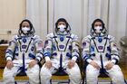 In this handout photo released by Russian Space Agency Roscosmos, from left, International Space Station (ISS) Expedition 65 crew members NASA astronaut Mark Vande Hai, Roscosmos cosmonauts Oleg Novitsky and Pyotr Dubrov pose for a photo before the Soyuz MS-18 spacecraft upcoming launch from the Baikonur Cosmodrome, Kazakhstan. The launch of the Soyuz-2.1a carrier rocket with the Soyuz MS-18 manned spacecraft painted with the portrait of Russian cosmonaut Yuri Gagarin, is scheduled for April 9. Editorial use only, no archive, no commercial use. Location: Kazakhstan, Baikonur. Kazakhstan Russia Space