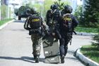 Riot police officers work at the scene of a shooting at Gymnasium No. 175 in Kazan, Russia's Republic of Tatarstan. According to preliminary data, six schoolchildren and a teacher were killed. The suspected attacker, a 19-year-old male, was detained earlier in the day. Location: Russia, Republic of Tatarstan, Kazan. Author: Maksim Bogodvid. Russia School Shooting