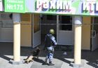 A riot police officer with a service dog works at the scene of a shooting at Gymnasium No. 175 in Kazan, Russia's Republic of Tatarstan. According to preliminary data, six schoolchildren and a teacher were killed. The suspected attacker, a 19-year-old male, was detained earlier in the day. Location: Russia, Republic of Tatarstan, Kazan. Author: Maksim Bogodvid. Russia School Shooting