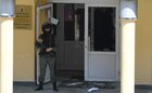 A riot police officer stands at the scene of a shooting at Gymnasium No. 175 in Kazan, Russia's Republic of Tatarstan. According to preliminary data, six schoolchildren and a teacher were killed. The suspected attacker, a 19-year-old male, was detained earlier in the day. Location: Russia, Republic of Tatarstan, Kazan. Author: Maksim Bogodvid. Russia School Shooting