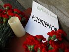 Flowers are placed to commemorate Kazan school shooting victims outside the representative office of Russia's Republic of Tatarstan in Moscow, Russia. At least nine people, including seven children, were killed in the school shooting in Kazan, while 20 more people were hospitalized with injuries. Location: Russia, Moscow. Author: Anton Denisov. Russia School Shooting