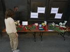 A woman lays flowers for Kazan school shooting victims outside the representative office of Russia's Republic of Tatarstan in Saint Petersburg, Russia. At least nine people, including seven children, were killed in the school shooting in Kazan, while 20 more people were hospitalized with injuries. A former student of the Gymnasium No. 175, 19-year-old male who started shooting at the educational institution was detained earlier in the day. Location: Russia, Saint Petersburg. Author: Alexander Galperin. Russia School Shooting