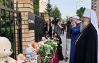 In this handout video grab released by Spiritual management of Muslims of the Republic of Tatarstan, Metropolitan Kirill (Mikhail Nakonechny) of Kazan and Tatarstan, and Tatarstan's Mufti Kamil Samigullin lay flowers at the scene of the shooting at Secondary School No 175. in Kazan, Russia's Republic of Tatarstan, Russia. At least nine people, including seven children, were killed in the school shooting in Kazan, while 20 more people were hospitalized with injuries. Location: Russia, Republic of Tatarstan, Kazan. Russia School Shooting