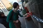 A woman lays flowers for Kazan school shooting victims outside the representative office of Russia's Republic of Tatarstan in Moscow, Russia. At least nine people, including seven children, were killed in the school shooting in Kazan, while 20 more people were hospitalized with injuries. A former student of the Gymnasium No. 175, 19-year-old male who started shooting at the educational institution was detained earlier in the day. Location: Russia, Moscow. Author: Anton Denisov. Russia School Shooting