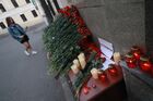 A girl lays flowers for Kazan school shooting victims outside the representative office of Russia's Republic of Tatarstan in Moscow, Russia. At least nine people, including seven children, were killed in the school shooting in Kazan, while 20 more people were hospitalized with injuries. A former student of the Gymnasium No. 175, 19-year-old male who started shooting at the educational institution was detained earlier in the day. Location: Russia, Moscow. Author: Anton Denisov. Russia School Shooting