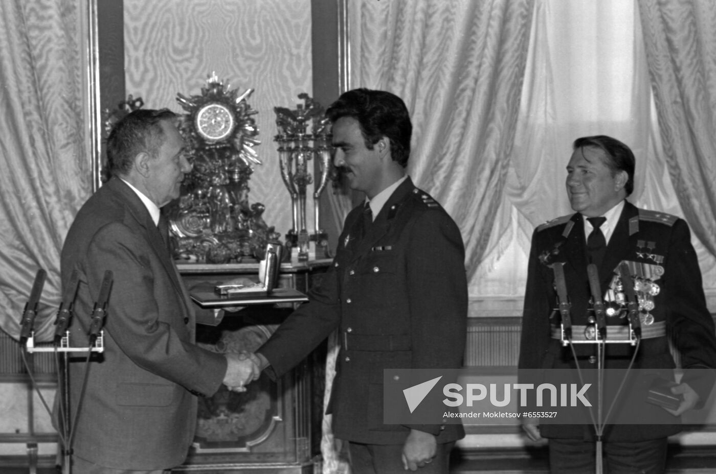 Presenting awards to Soviet-Afghan crew of Soyuz TM-6